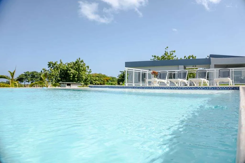 Casa Linda Villa Whitesabd Pool and back of Villa