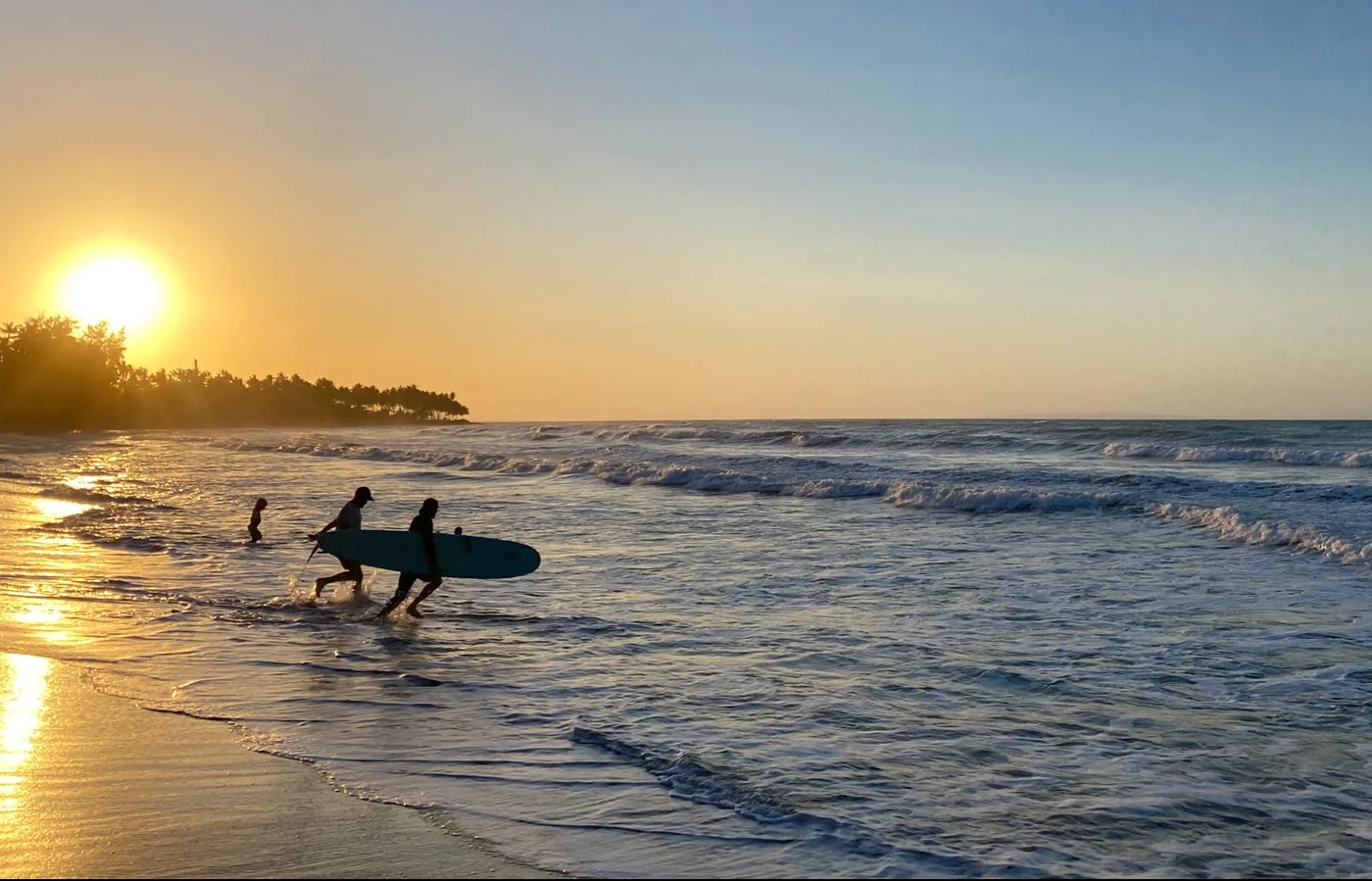 Encuentro Beach Sunset Surfers
