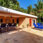Covered Terrace with Bar Chairs, Laundry Room and 1 Bedroom
