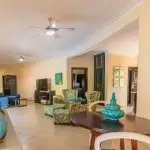 Bright and Spacious Living Area with direct walk out to Pool & tropical backyard